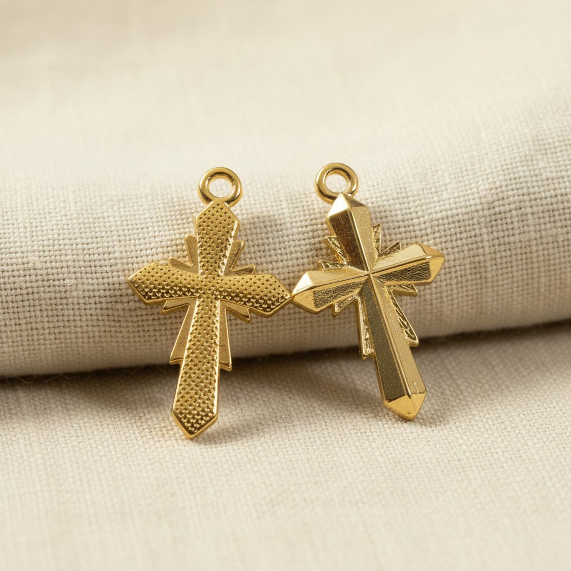 Hackberry Creek 24K gold plated geometric cross pendants with faceted surfaces and a textured finish. Set of 2 charms.