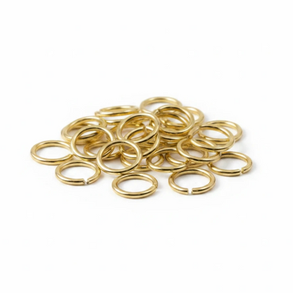 Hackberry Creek 10mm bright gold jump rings made of 15 gauge 304 stainless steel for jewelry making.