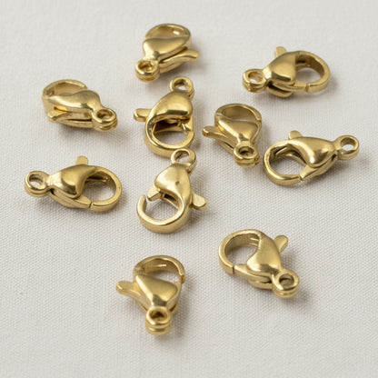Hackberry Creek set of 10 small 18k gold-plated stainless steel lobster claw clasps for minimalist jewelry making.