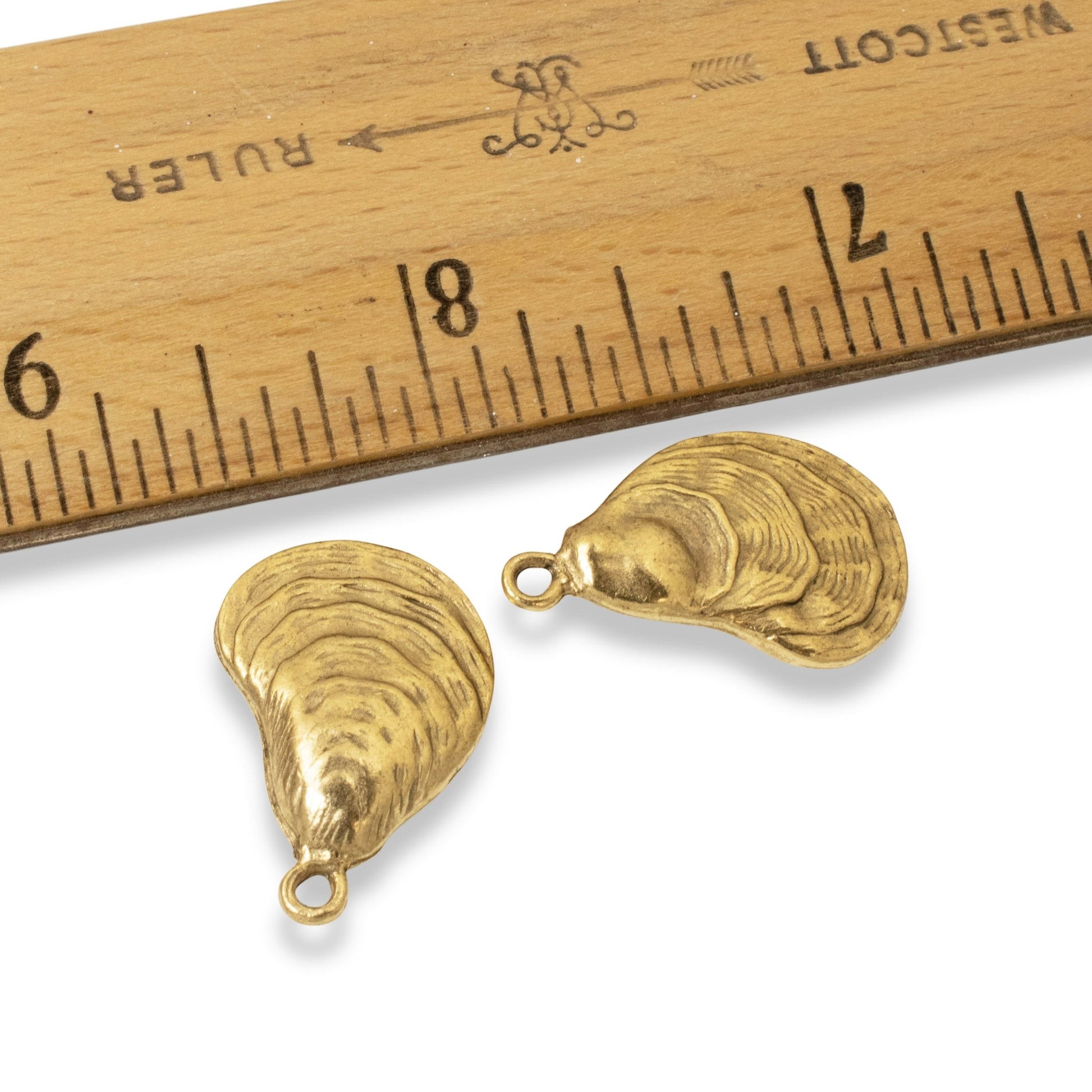 Hackberry Creek set of two 24k gold plated oyster shell charms with antiqued finish for coastal jewelry making