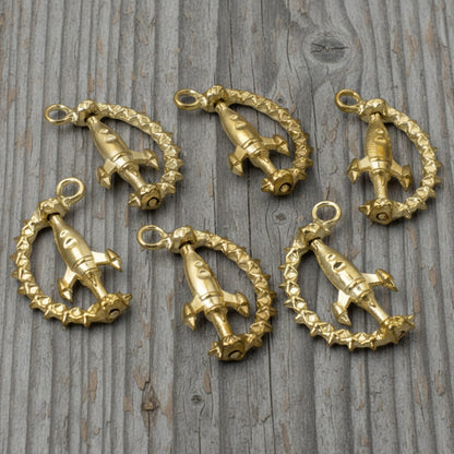 Hackberry Creek gold spinning rocket charms with star details for space-themed jewelry making, 6-pack set