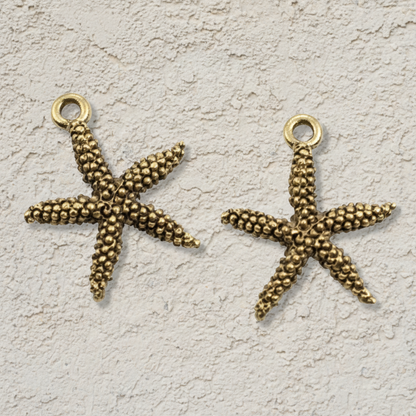 Hackberry Creek antique gold pewter starfish charms with detailed texture for coastal jewelry making