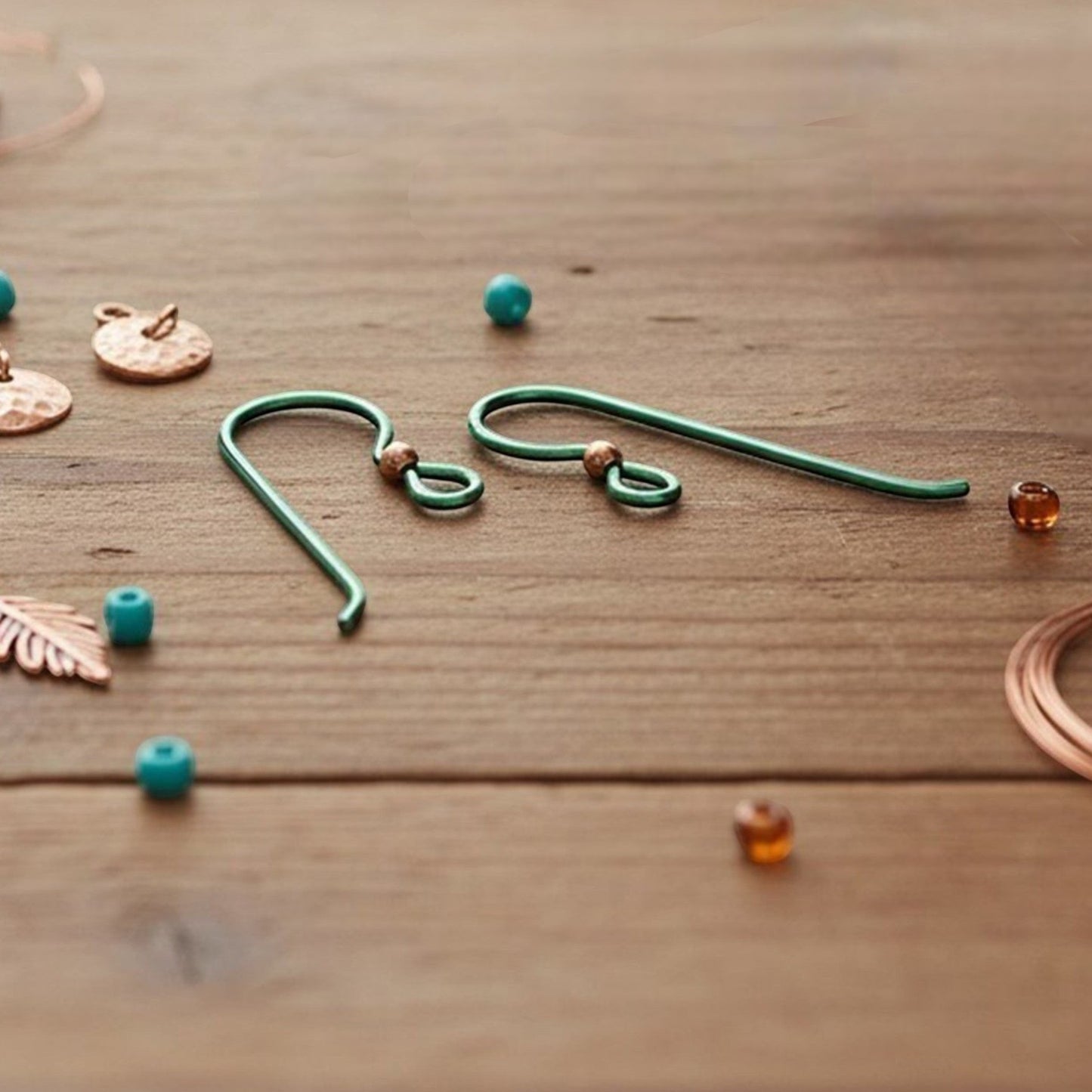 Hackberry Creek bright emerald green niobium ear wires with copper accent bead, 8mm x 23mm, 20 gauge, hypoallergenic.