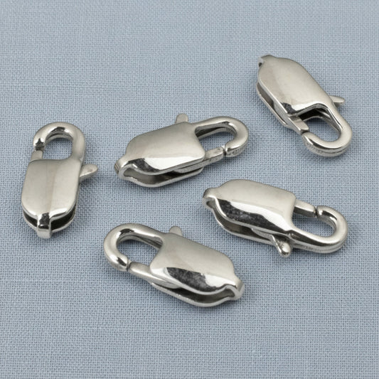 Hackberry Creek set of five large oval silver stainless steel lobster claw clasps for jewelry making.