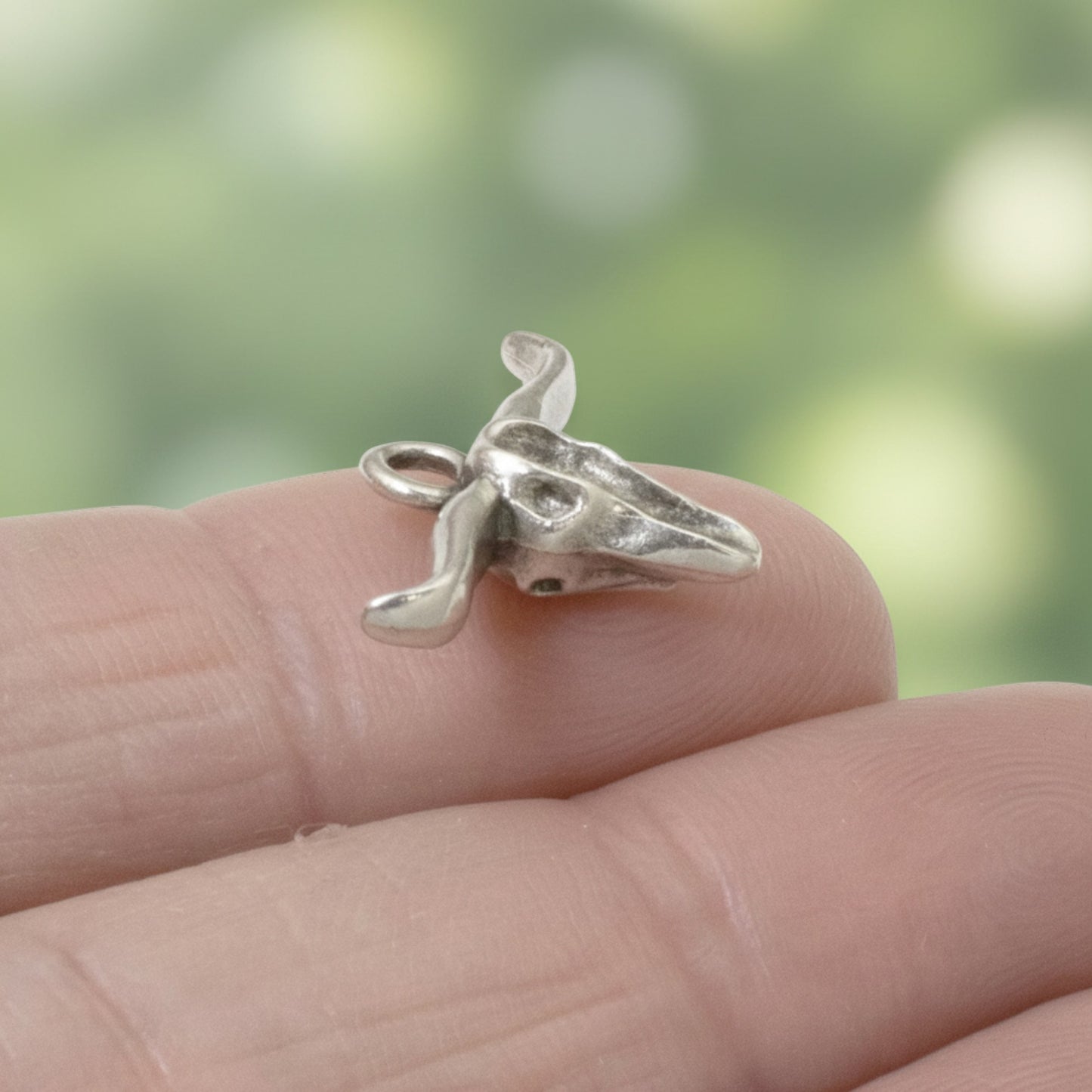 Hackberry Creek silver longhorn steer skull charm with antique oxidized finish for southwestern jewelry making.