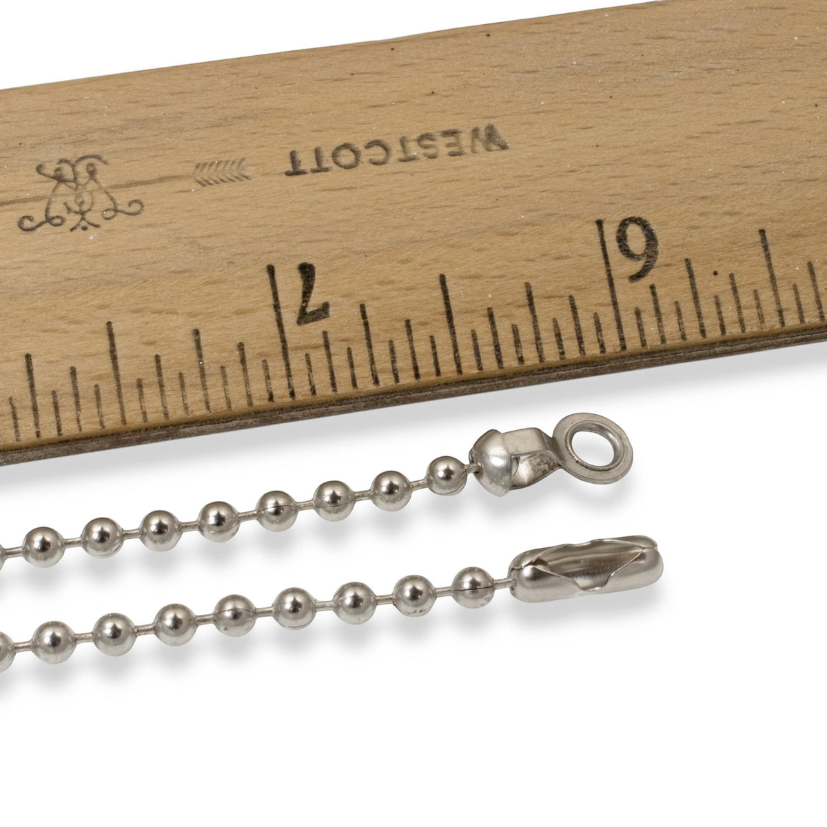 Hackberry Creek nickel-plated steel ball chain set with connectors and couplings measured against a wooden ruler