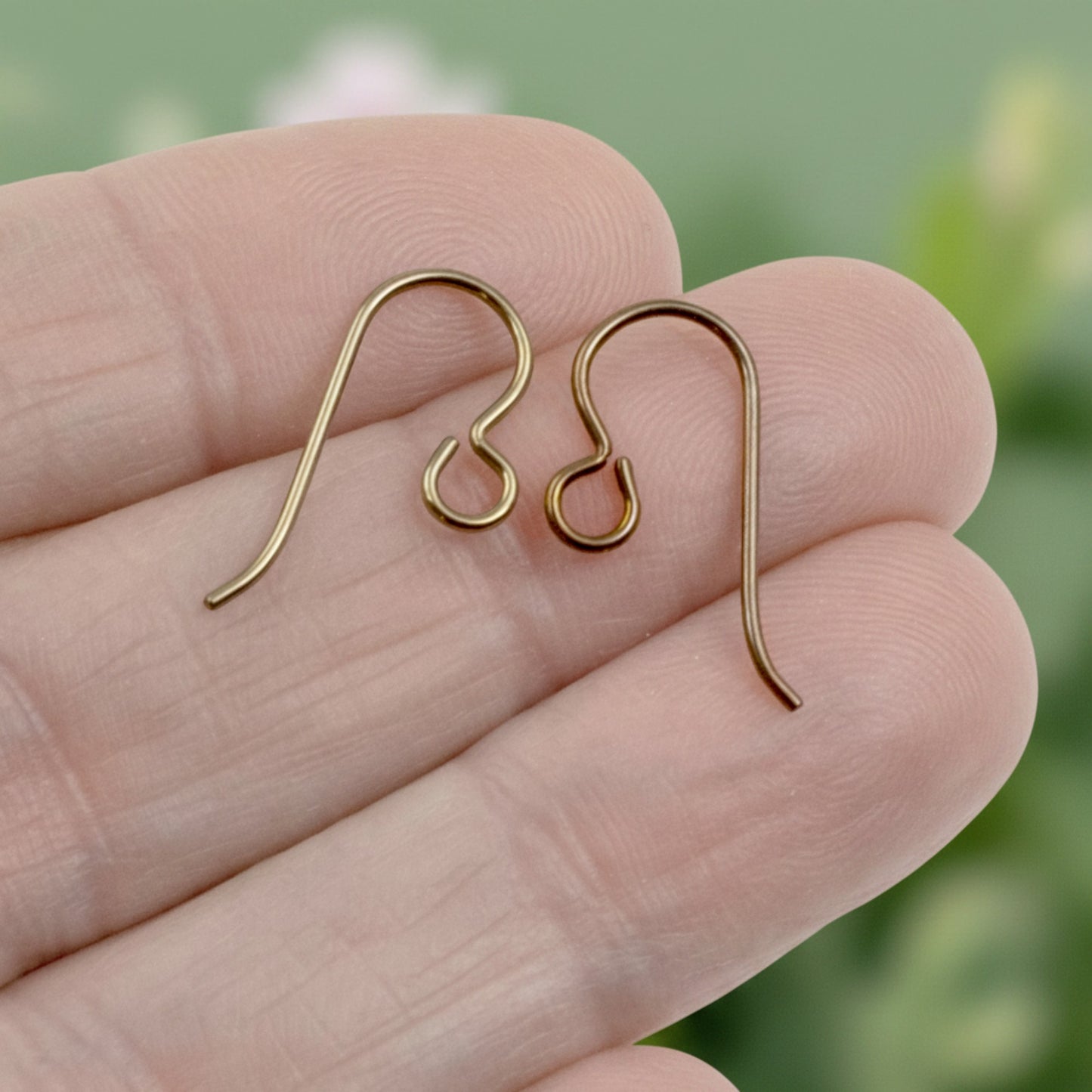 Hackberry Creek 8-pair hypoallergenic niobium ear wires in antique brass and bronze finishes. Professional 20-gauge wire.