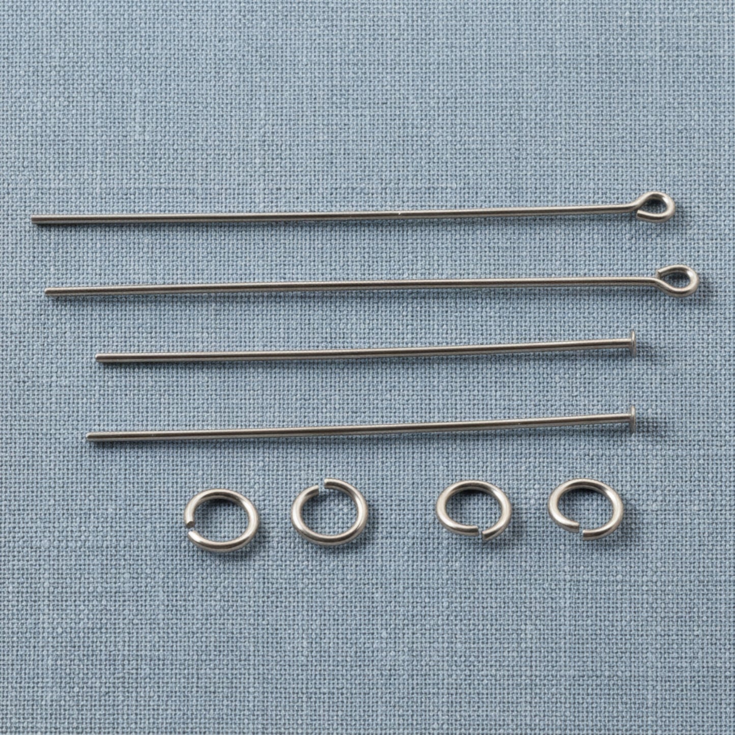 Hackberry Creek gray niobium earring kit for 2 pairs of hypoallergenic jewelry. Includes ear wires, head pins, eye pins, and jump rings.