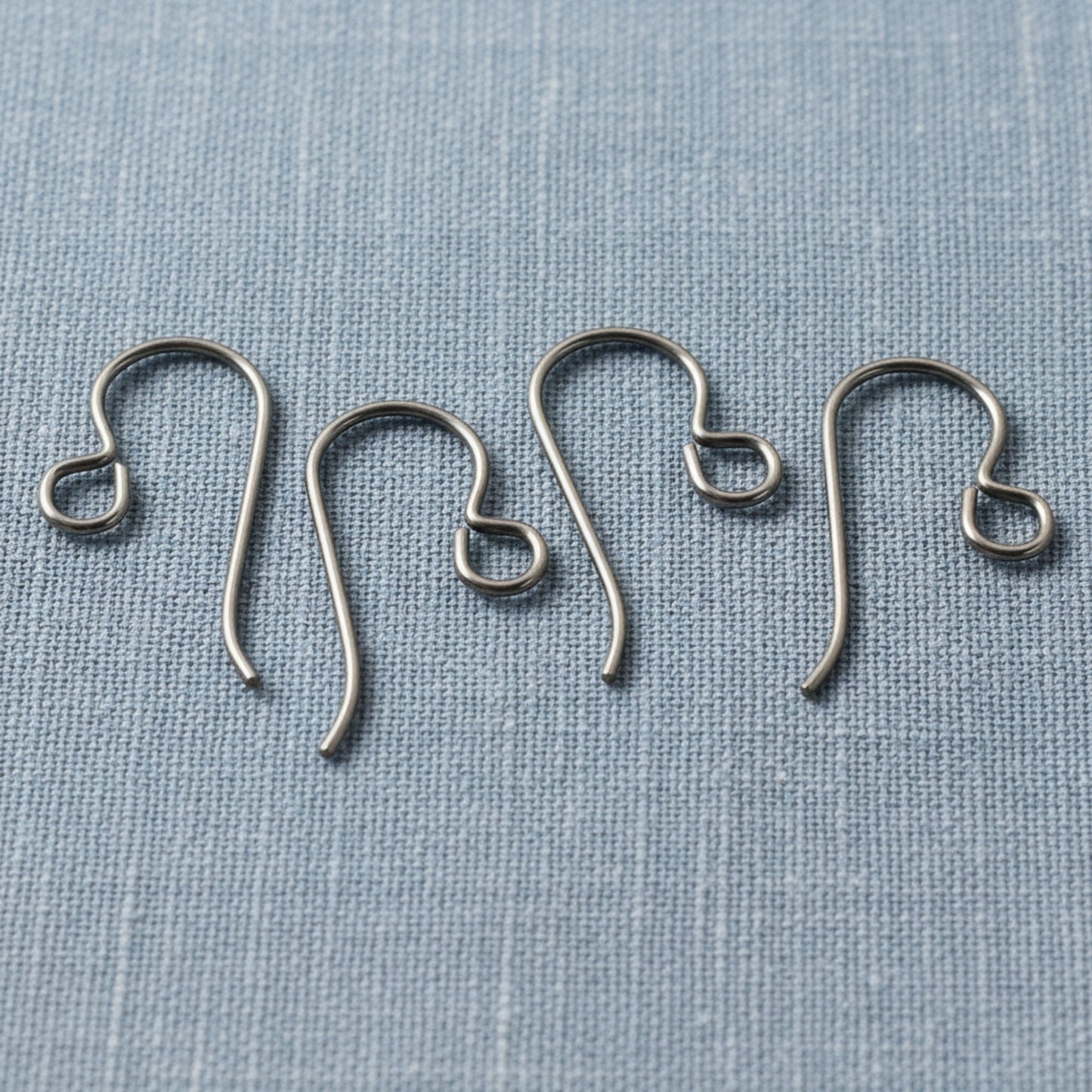 Hackberry Creek gray niobium earring kit for 2 pairs of hypoallergenic jewelry. Includes ear wires, pins, and jump rings.