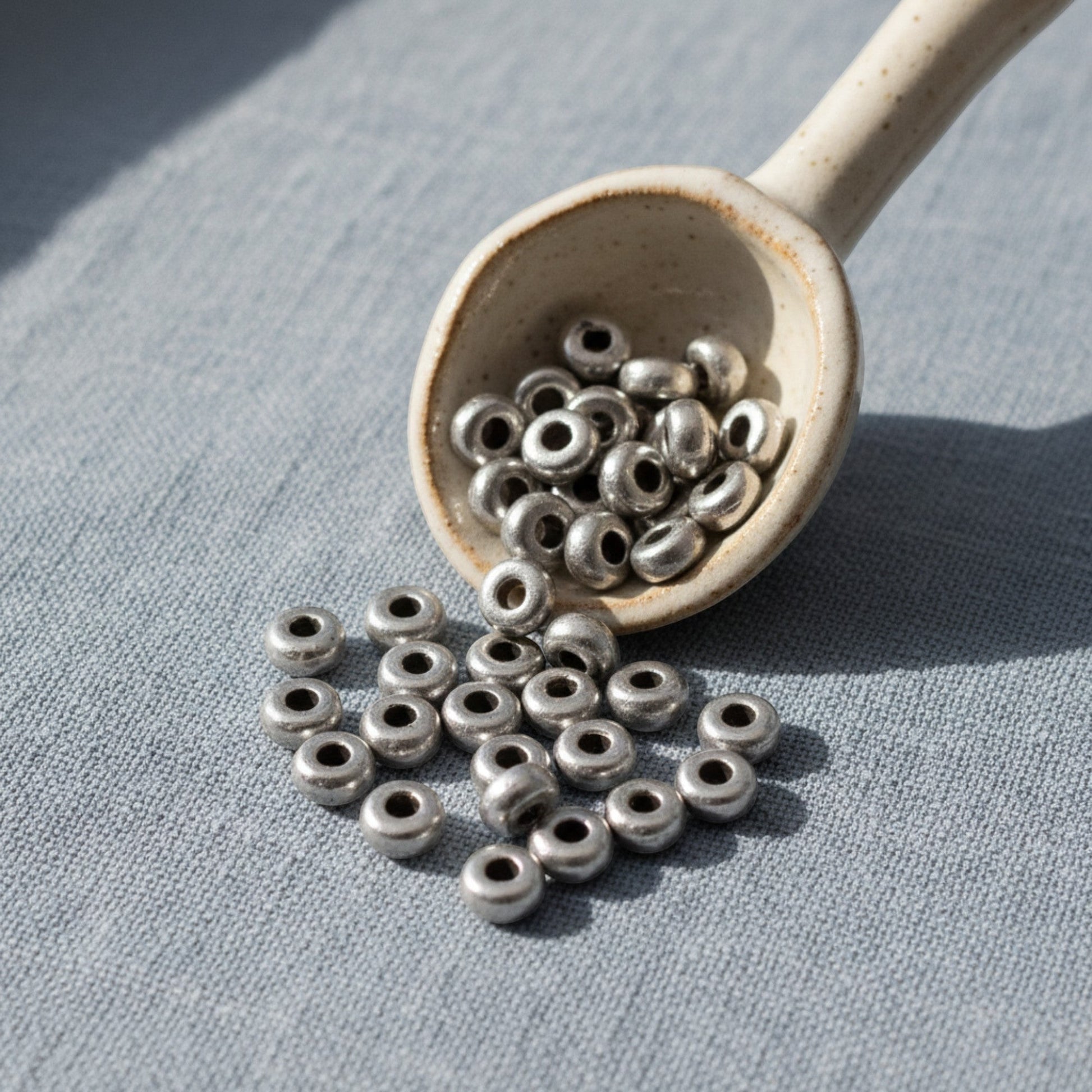 Hackberry Creek pewter 3mm smooth heishi disk spacer beads, 50-pack, neutral tone for jewelry making.