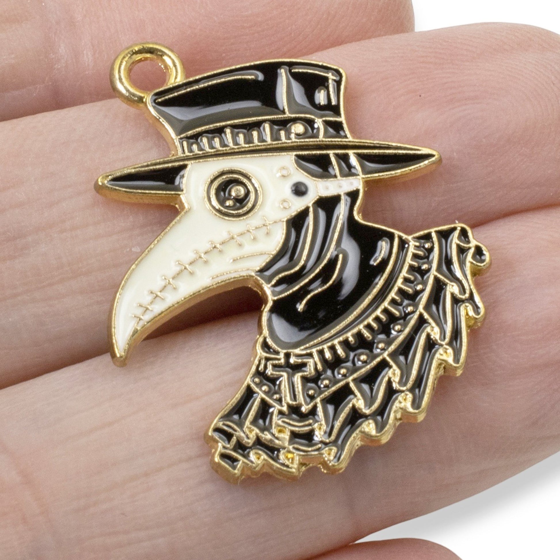 Hackberry Creek plague doctor raven head pendant in black and white enamel with gold-plated metal outline