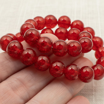 Hackberry Creek 10mm round red glass crackle beads for jewelry making. Pack of 30.