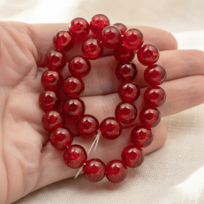 Hackberry Creek 10mm round red glass crackle beads for jewelry making. Pack of 30.