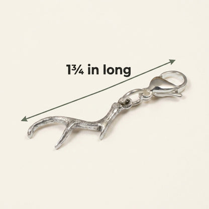 Hackberry Creek silver antler clip-on charm with a lobster clasp, measuring 1 3/4 inches for bags and jewelry.