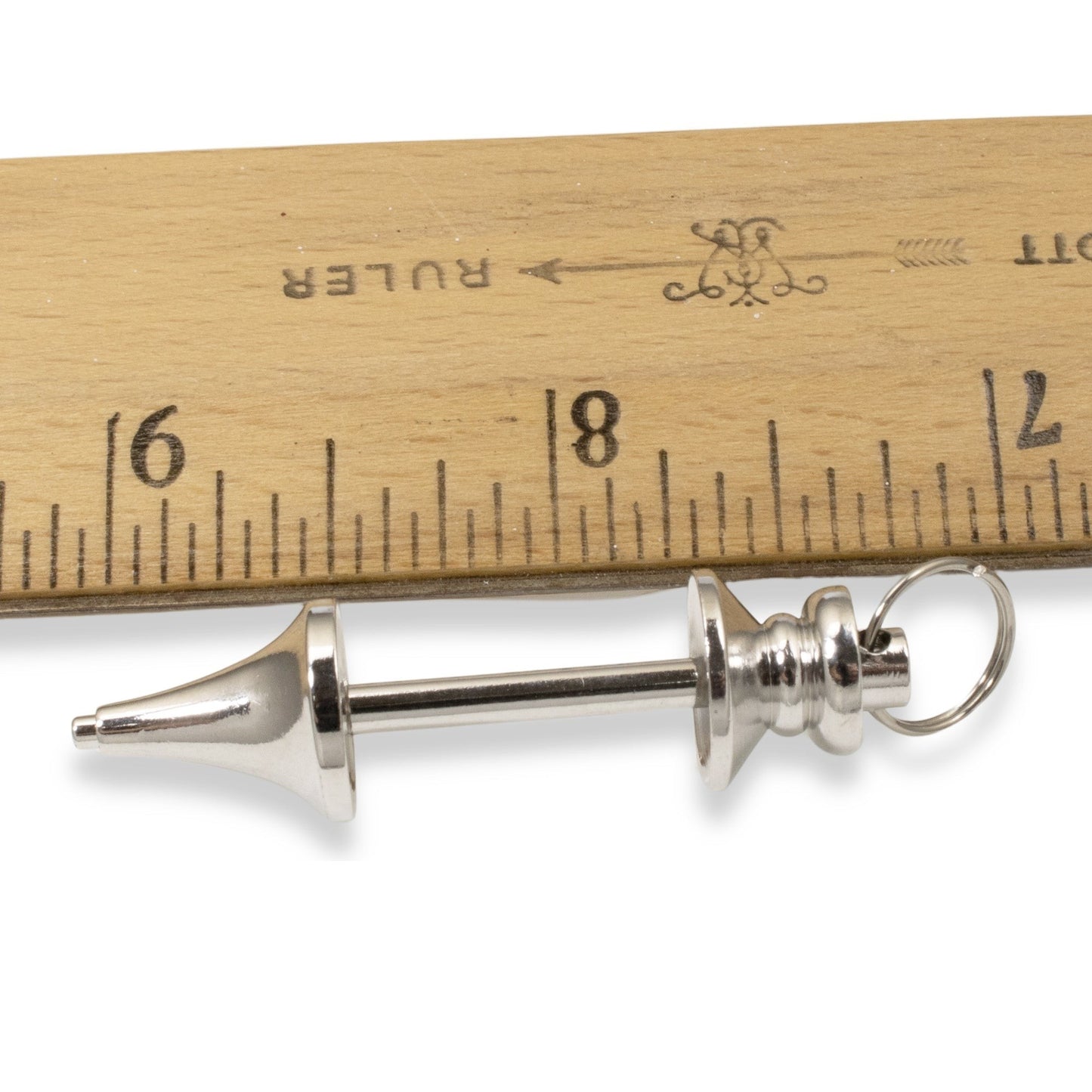 Hackberry Creek silver zinc alloy beadable pendant blank for jewelry making shown next to a wooden ruler for scale