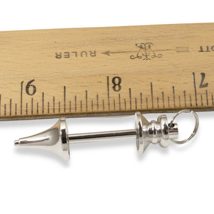 Hackberry Creek silver zinc alloy beadable pendant blank for jewelry making shown next to a wooden ruler for scale