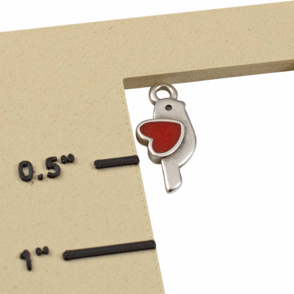 Hackberry Creek antique silver bird charm with red enamel heart, 8x18mm. Perfect for martaki bracelets, Valentine's jewelry.