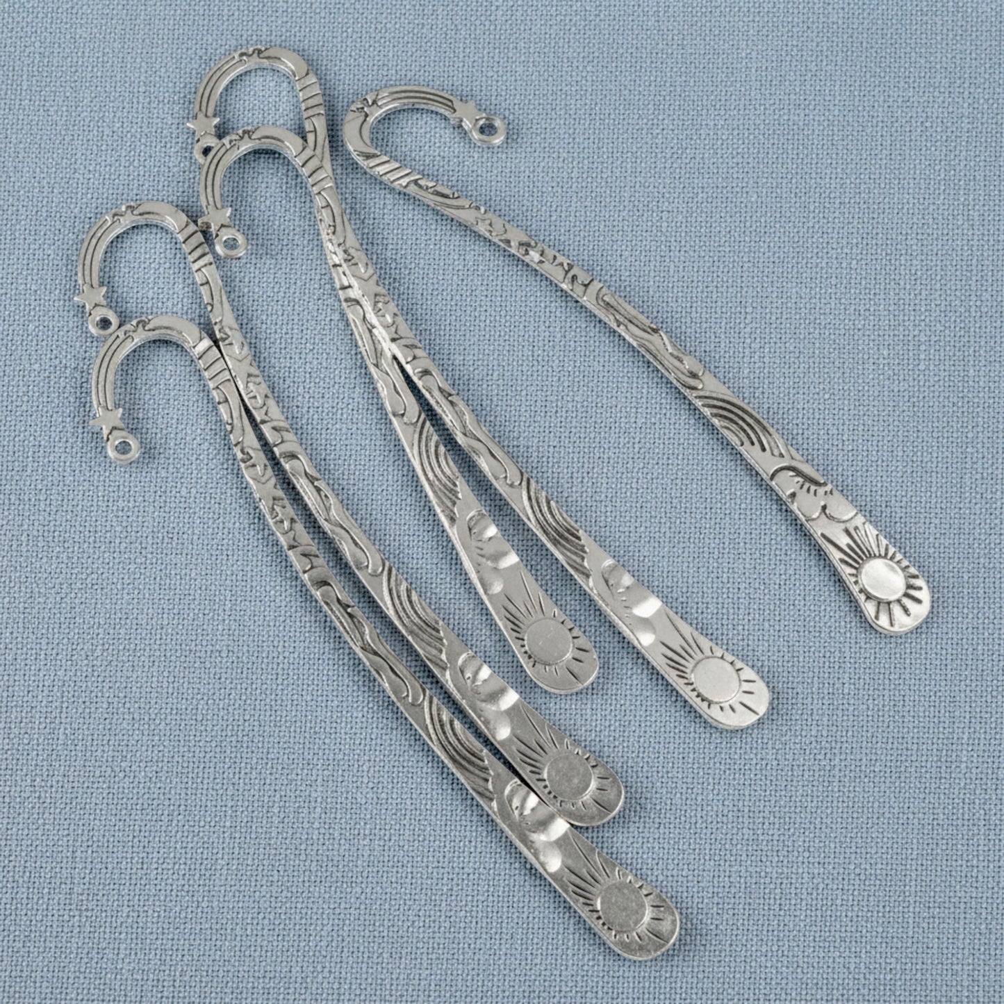 Hackberry Creek set of five antique silver zinc alloy metal bookmarks featuring celestial sun and star designs
