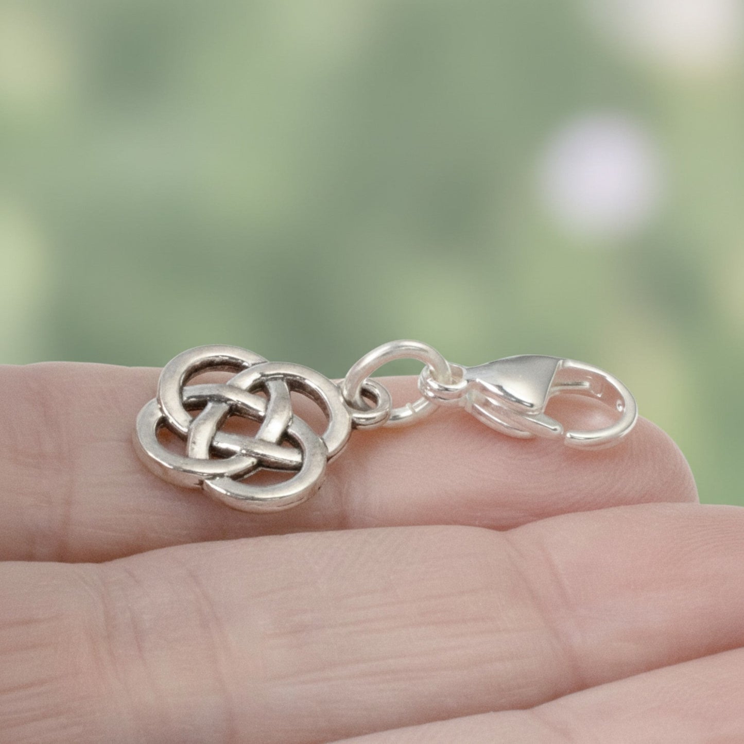 Hackberry Creek silver plated metal alloy Celtic knot charm with stainless steel lobster clasp.
