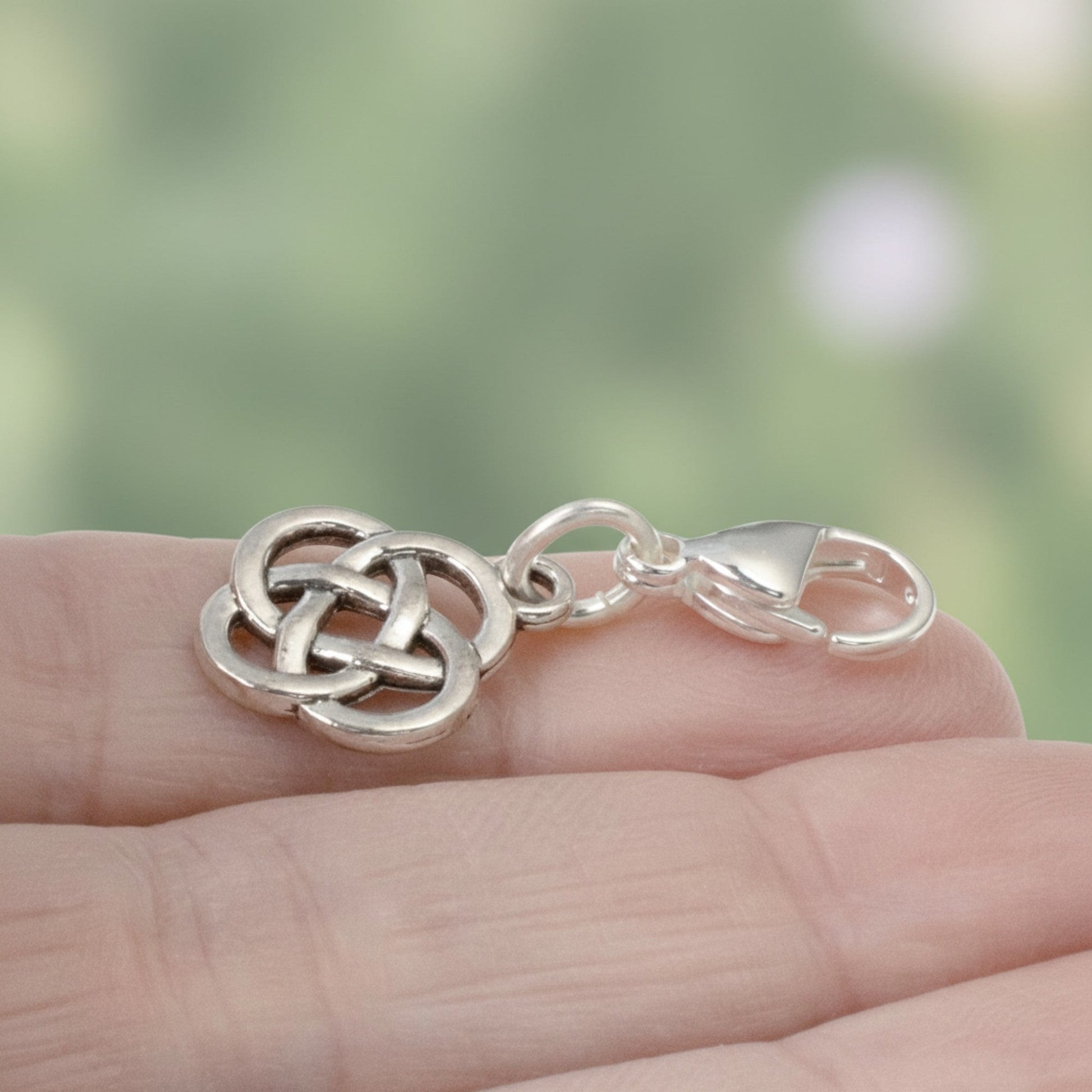 Hackberry Creek silver plated metal alloy Celtic knot charm with stainless steel lobster clasp.