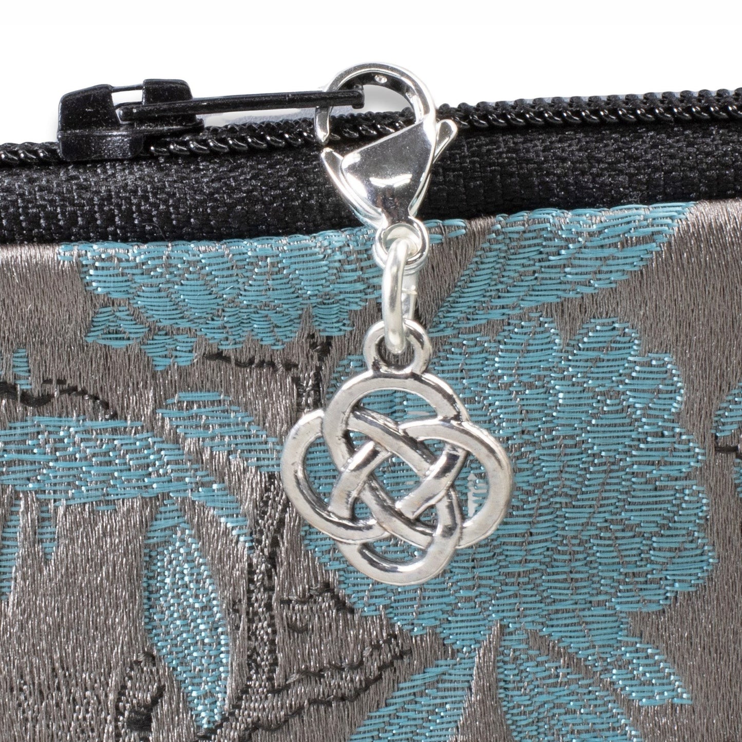 Hackberry Creek silver Celtic knot charm with lobster clasp, clips onto bags and jewelry.