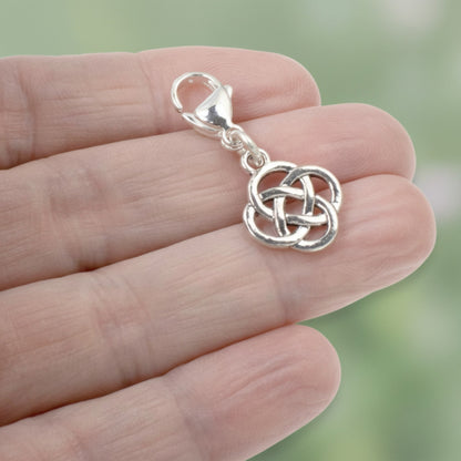 Hackberry Creek silver plated metal alloy Celtic knot charm with stainless steel lobster clasp. Open design, 1 3/8" length.
