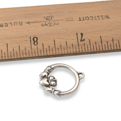 Hackberry Creek antique silver Claddagh charm pendant, 19.5mm x 24.5mm, made of lead-free pewter with .999 fine silver plating.