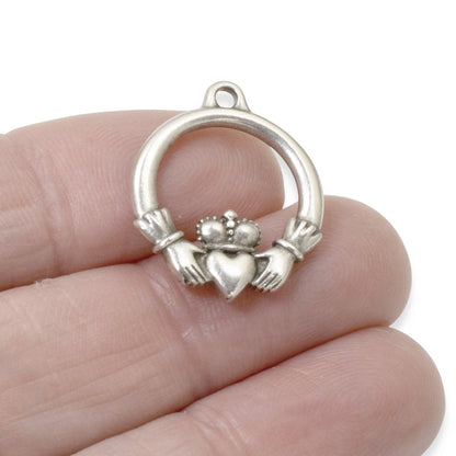 Hackberry Creek antique silver Claddagh charm pendant, symbolizing love, loyalty, and friendship. Crafted from pewter with silver plating.
