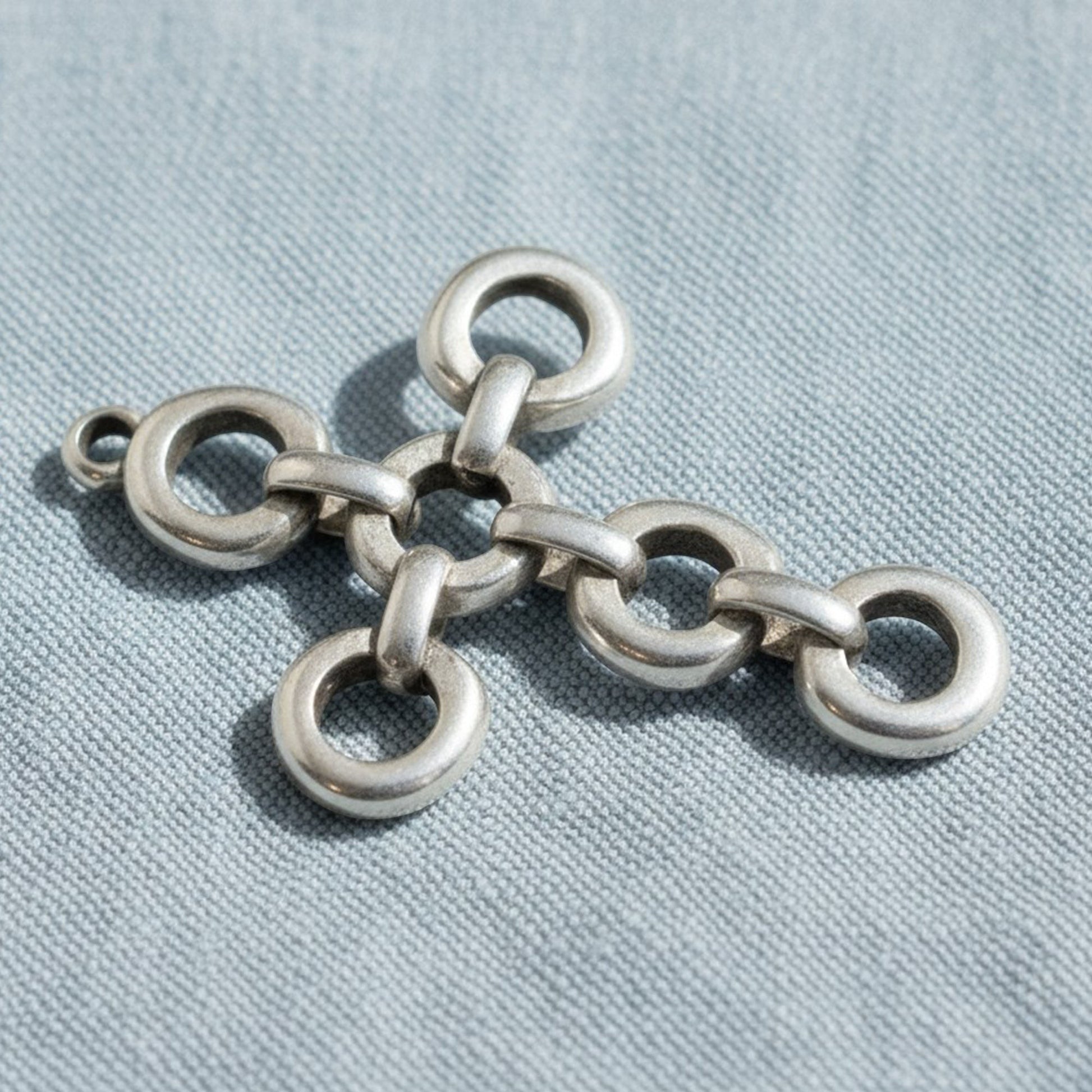 Hackberry Creek antique silver plated open chain link cross pendant with multiple connectors. European cast metal.