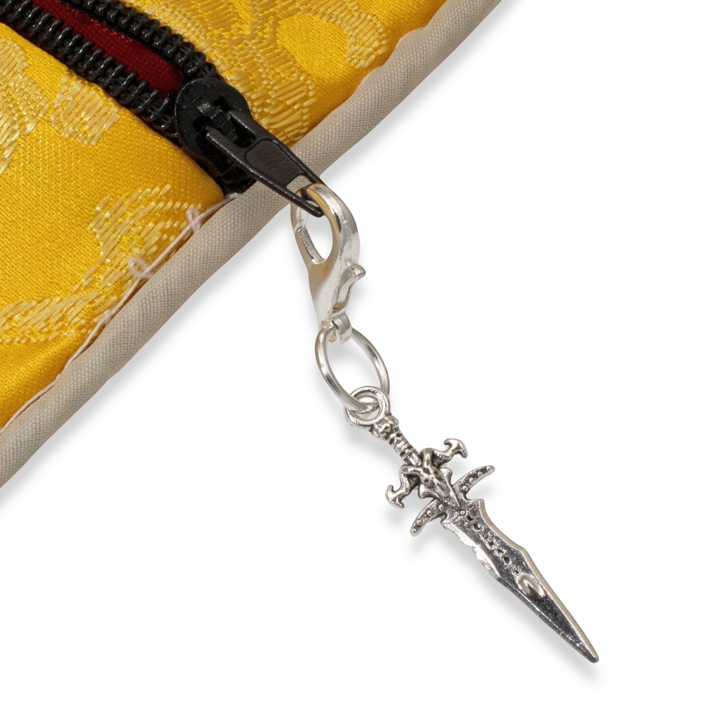 Hackberry Creek silver metal alloy dagger charm with intricate detailing and lobster clasp.