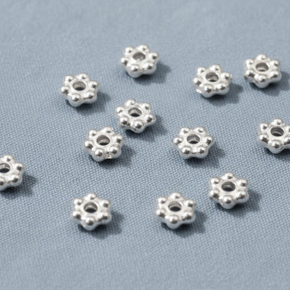 Hackberry Creek 500 bright silver 3mm daisy heishi spacer beads made of pewter with silver plating.