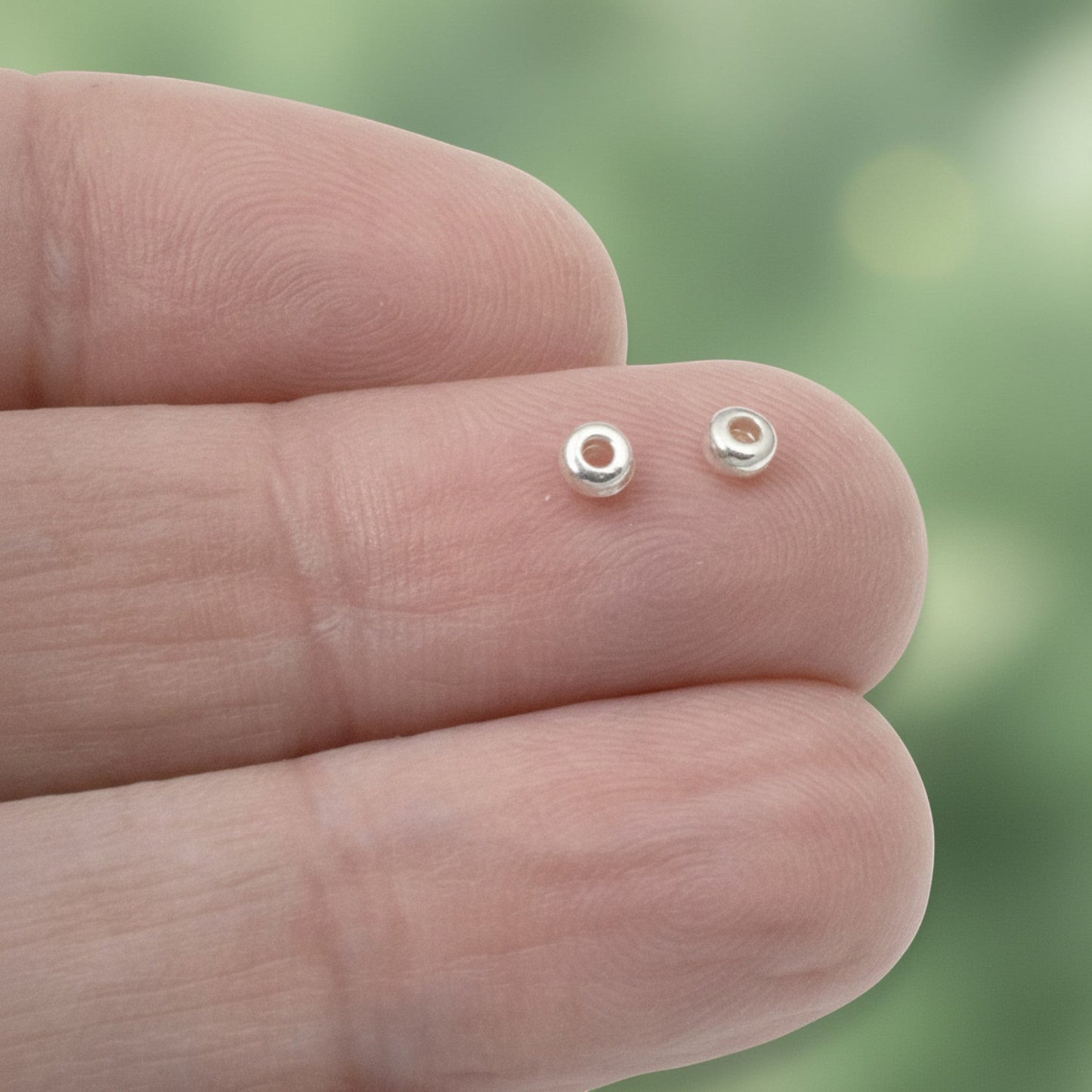Hackberry Creek silver 3mm disk beads, smooth heishi spacers made of pewter with .999 fine silver plating.