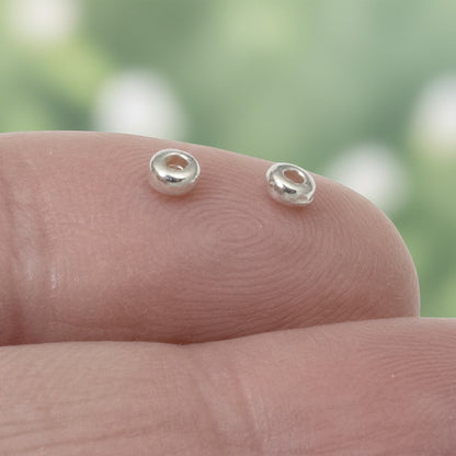 Hackberry Creek silver 3mm disk beads, smooth heishi spacers made of pewter with .999 fine silver plating.