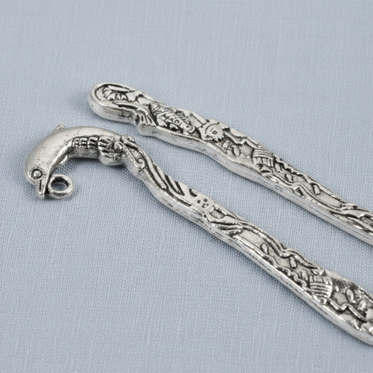Hackberry Creek set of 5 antique silver zinc alloy dolphin bookmarks with intricate beach-themed engraved designs