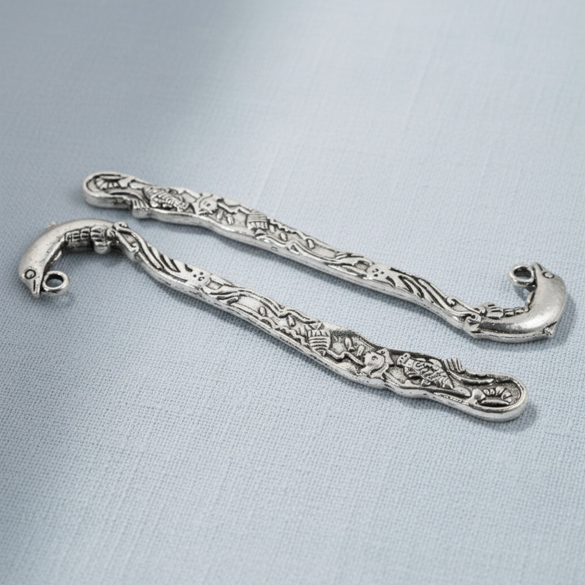 Hackberry Creek set of 5 antique silver zinc alloy dolphin bookmarks with intricate beach-themed designs for charms.