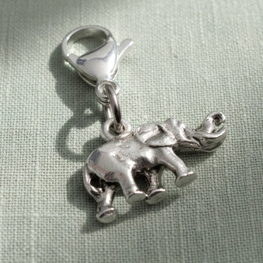 Hackberry Creek silver plated pewter elephant charm with a lobster clasp and detailed trunk up design