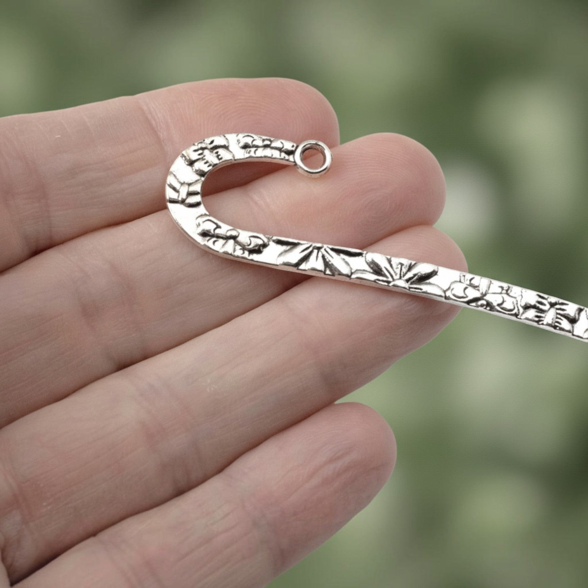 Hackberry Creek silver zinc alloy bookmark blank with floral and butterfly pattern and a hook for charms.