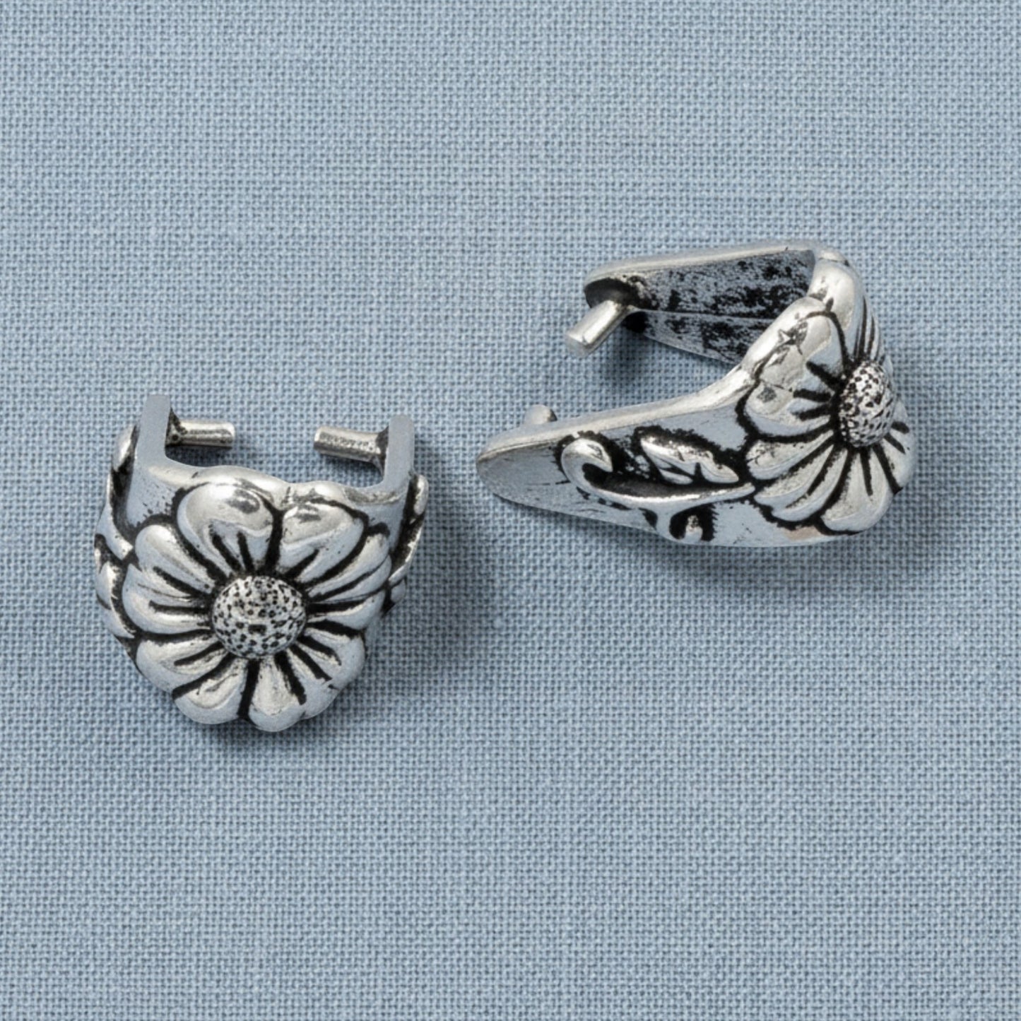 Hackberry Creek silver pinch bails with antique floral vine design for jewelry making and pendant attachment