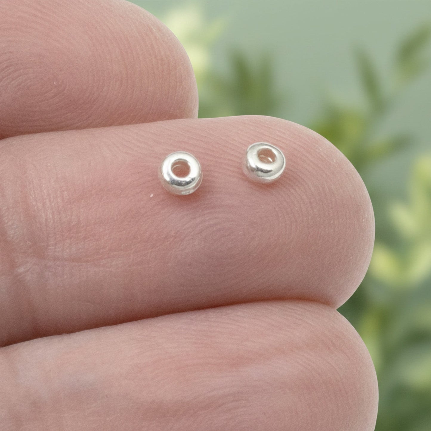 Hackberry Creek 3mm silver heishi disc spacer beads made of pewter with .999 fine silver plating.