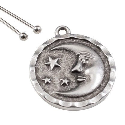 Hackberry Creek antique silver celestial pendant featuring a crescent moon and stars on a textured round charm