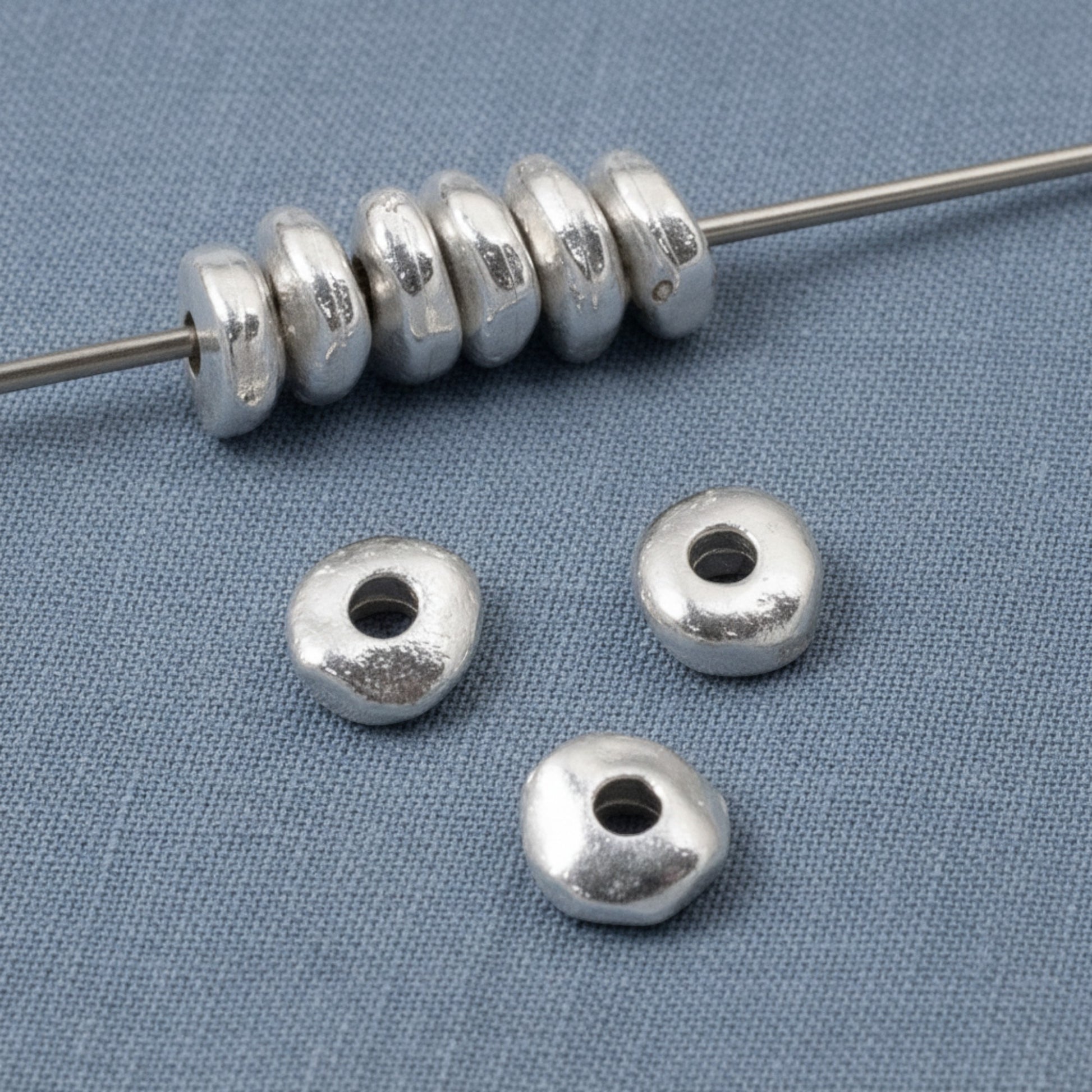 Hackberry Creek bright silver nugget beads, 5mm organic shape metal spacer beads for jewelry making.
