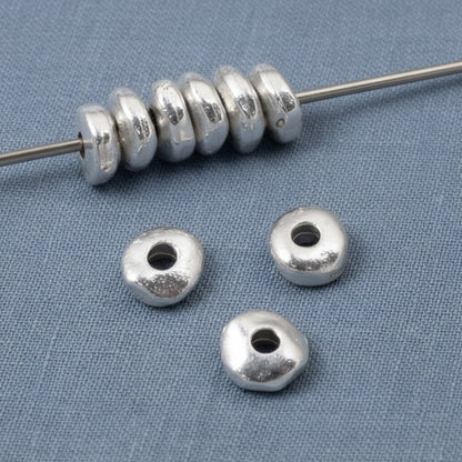 Hackberry Creek bright silver nugget beads, 5mm organic shape metal spacer beads for jewelry making.