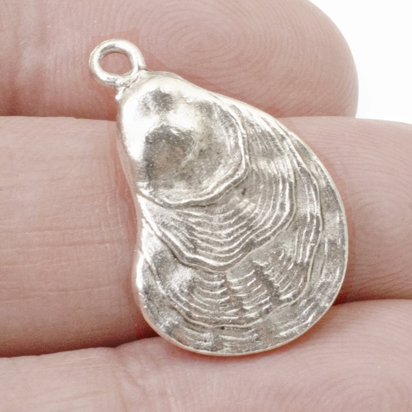 Hackberry Creek antique silver oyster shell charm pendant for coastal jewelry making
