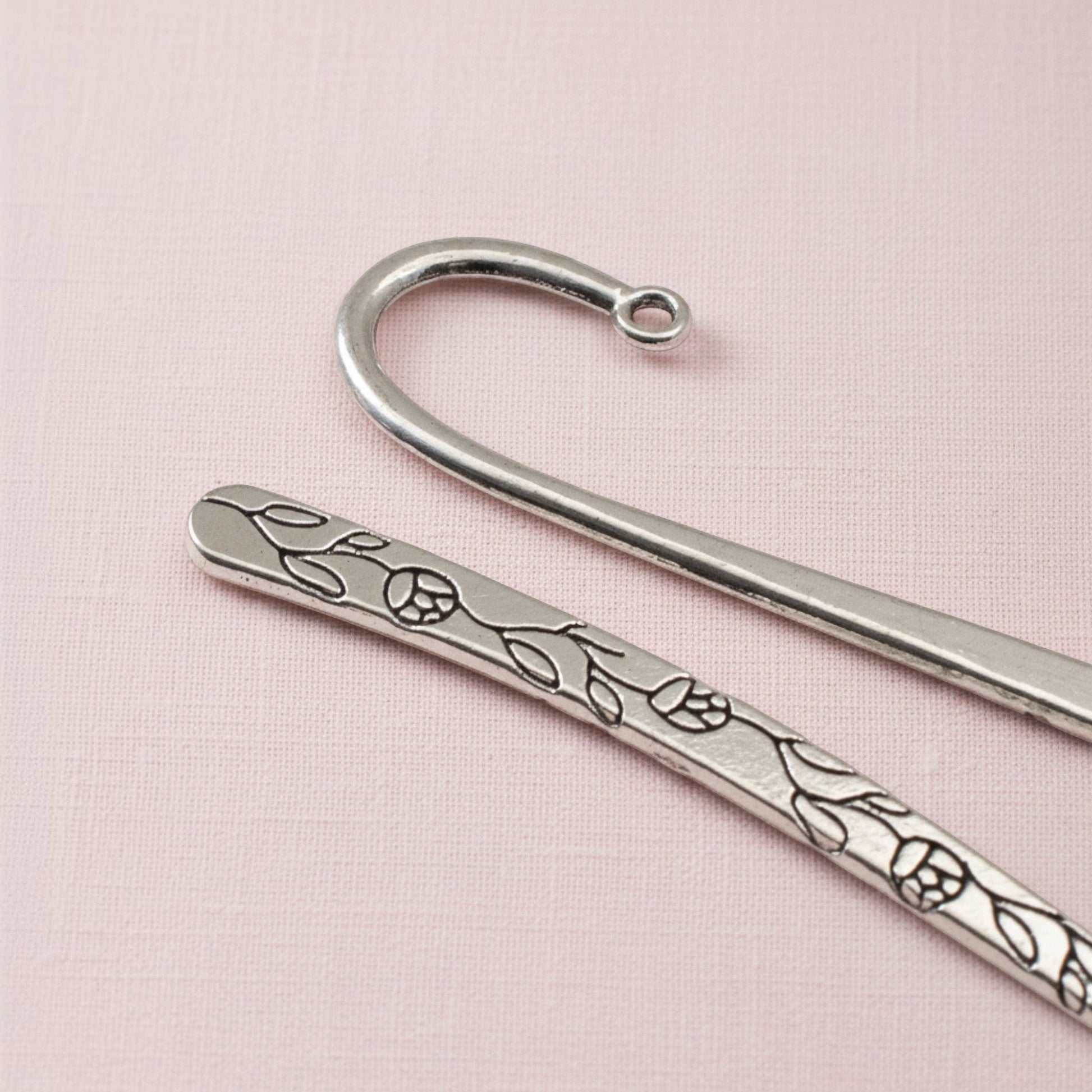 Hackberry Creek antique silver metal bookmarks with etched rose and vine floral patterns and shepherd hook tops.