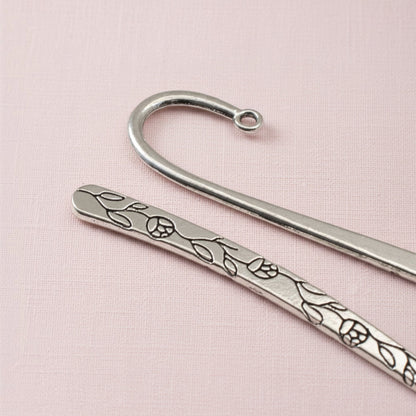 Hackberry Creek antique silver metal bookmarks with etched rose and vine floral patterns and shepherd hook tops.