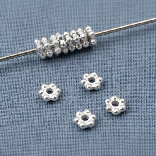Hackberry Creek 3mm bright silver pewter daisy heishi spacer beads, 500-count bulk pack.