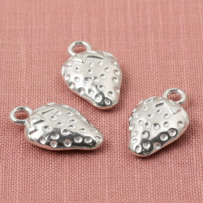 Hackberry Creek silver zinc alloy strawberry charms with textured detail and hanging loops, 10mm x 17mm.