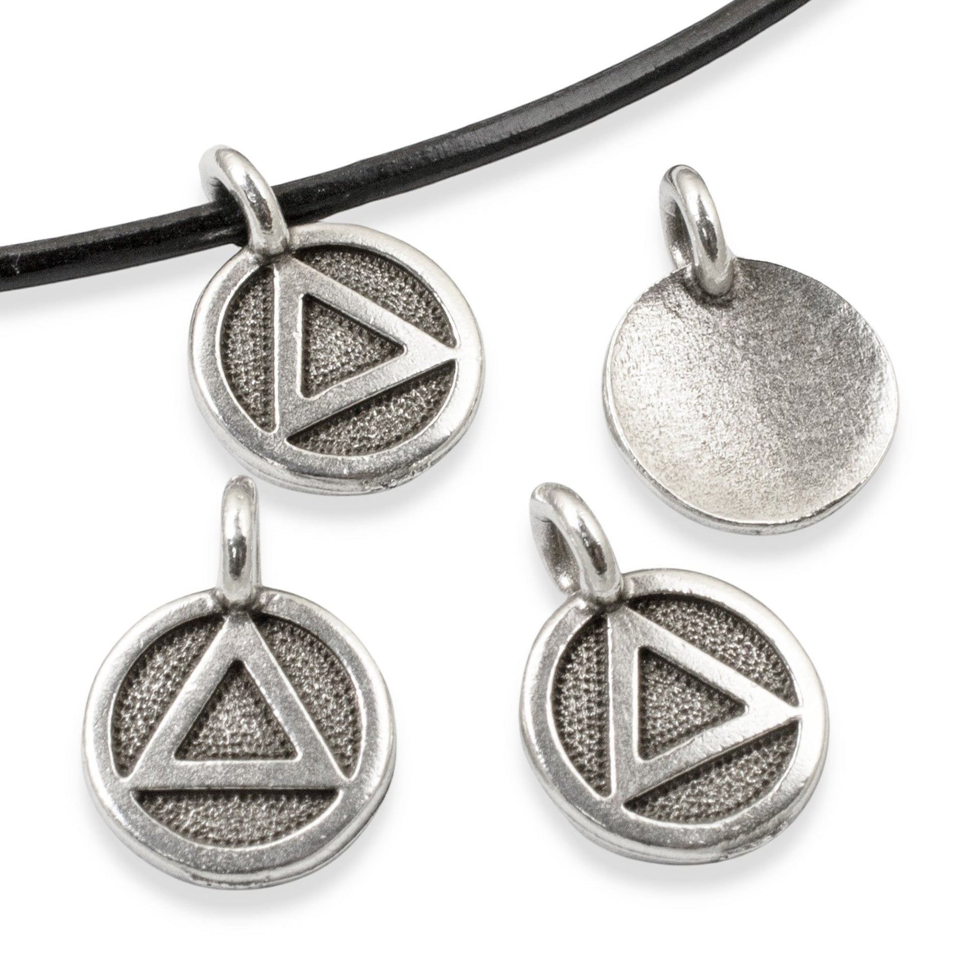 Hackberry Creek 4pc silver triangle recovery charms with antique oxidized finish on black leather cord.