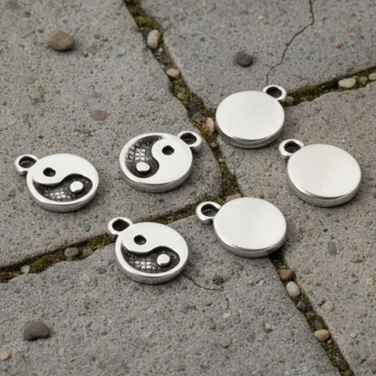 Hackberry Creek mini silver yin yang charms for jewelry making, featuring antique finish and spiritual balance symbols.