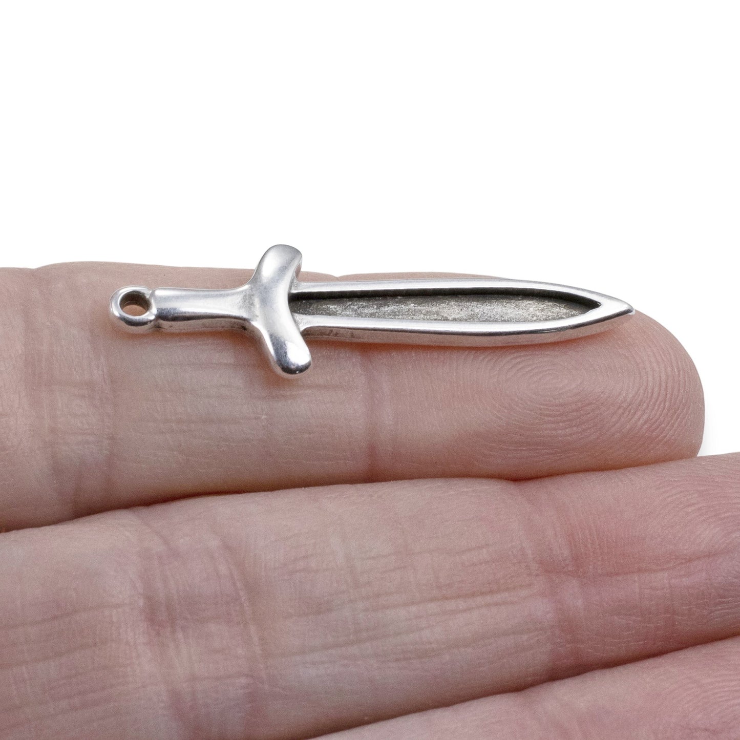 Hackberry Creek antique silver plated Zamak sword dagger charm, 11.5mm x 38.5mm, double-sided with recessed front for enamel.